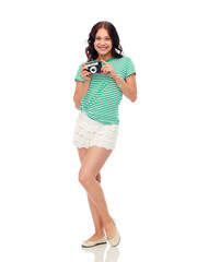 leisure, photography and people concept - smiling teenage girl with vintage film camera