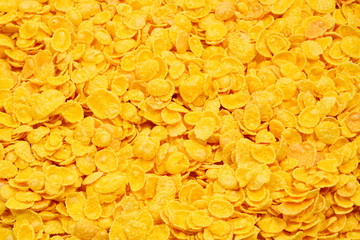 Corn-flakes background and texture. Top view. cornflake cereal box for morning breakfast.