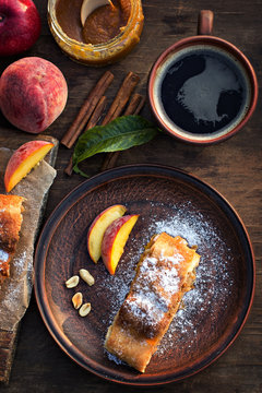 strudel with peaches, apples and peanuts