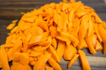 butcher block cutting board with vegetables