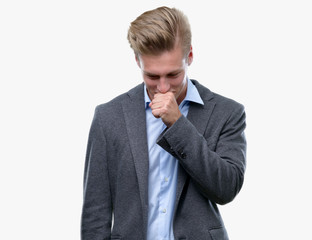 Young handsome blond business man feeling unwell and coughing as symptom for cold or bronchitis. Healthcare concept.