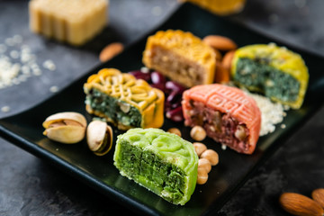 Mid Autumn Festival concept - yuebing monncakes on rustic background