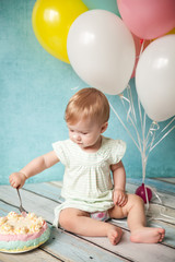 Fototapeta na wymiar First birthday party. Cute little girl