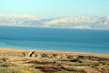 Dead Sea Panorama from the Israeli coast against the background of Jordanian hills from another...