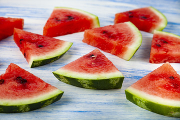Pieces of watermelon on a wooden table
