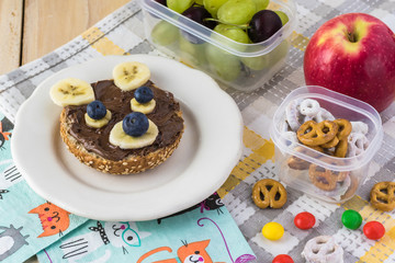 School lunch chocolate spread banana blueberry sandwich for kids.