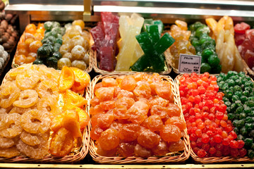 Assortment of dried fruits on display at at the Boqueria market in Barcelona. Counter In Spanish Market