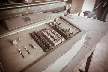 Old retro classic typewriter on wood.vintage tone