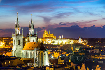 Fototapeta na wymiar Amazing cityscape view of Prague Castle and church of our Lady Tyn, Czech Republic during sunset time. View from powder tower. World famous landmarks in Europe.