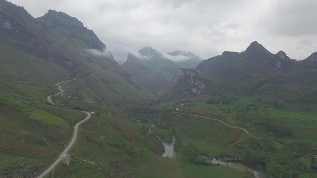 Drone shot: Road cut the to mountain of Ha Giang, Vietnam