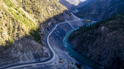 Beautiful mountain road along the river bed