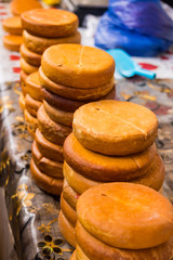 Suluguni cheese piece. Pickled or brined traditional Georgian smocked cheese from the Samegrelo region made of cow milk. Popular diary product in Georgia