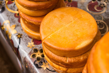 Suluguni cheese piece. Pickled or brined traditional Georgian smocked cheese from the Samegrelo region made of cow milk. Popular diary product in Georgia