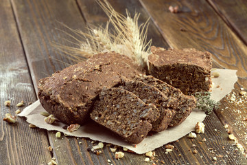 baked bread on wooden table background
