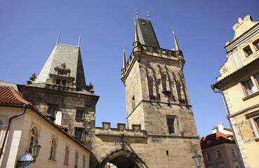 Fototapeta na wymiar Tower at the Lesser - Town Mala Strana end of Charles Bridge in Prague. Czech Republic