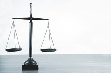 Law scales on table background