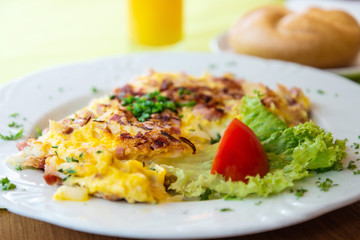 omelet with ham tomato and green salad
