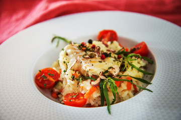 Andalusian fish, saffron rice with vegetables