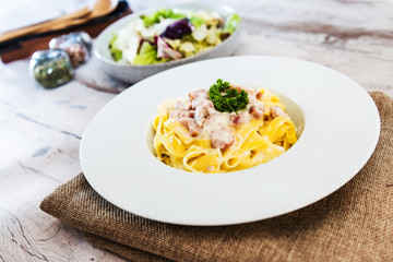 tasty Carbonara pasta on the table
