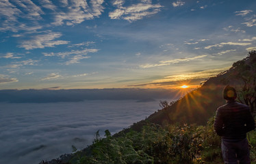 Scenic natural sunlight, sunrise orange, white mist flowed beautifully. Doi Tule at Tak in Thailand.