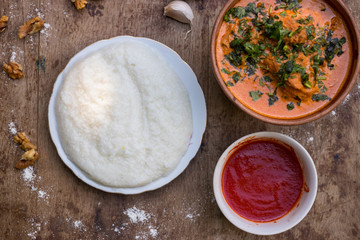 Gomi (mamaliga porridge) - popular dish from Samegrelo region made of white coarse cornmeal, butter and salt. Georgian traditional food.