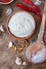 Gomi (mamaliga porridge) - popular dish from Samegrelo region made of white coarse cornmeal, butter and salt. Georgian traditional food.