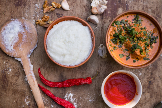 Gomi (mamaliga porridge) - popular dish from Samegrelo region made of white coarse cornmeal, butter and salt. Georgian traditional food.