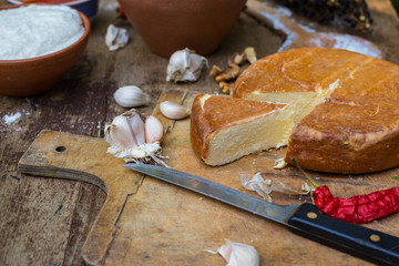 Suluguni cheese piece. Pickled or brined traditional Georgian smocked cheese from the Samegrelo region made of cow milk. Popular diary product in Georgia