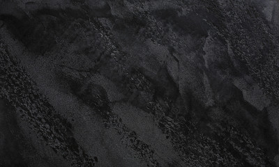 Dark grey or black slate textured background