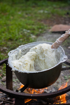 Elarji - from Samegrelo region, made from coarse cornmeal, cornflour and Suluguni cheese. Gomi cooked with cheese. Georgian traditional food - elardji. 