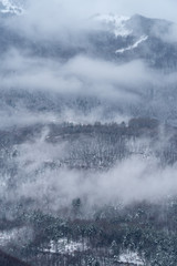 Obraz na płótnie Canvas Fog revealing the mountain range