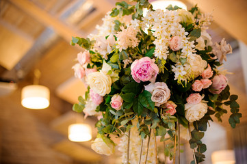 Wedding decor bouquet of tender pink peonies and roses