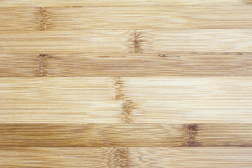 Naklejka premium Board made of natural bamboo wood. Textures pattern background in light yellow cream beige brown color.