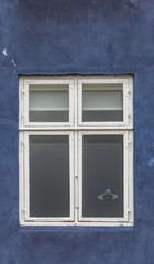 Window on the colorful facade