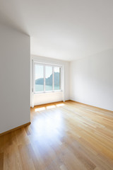White room with lake view window