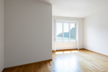 White room with lake view window