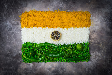 Indian flag with vegetables and rice. Vegetarian indian food. Top view. Gray background