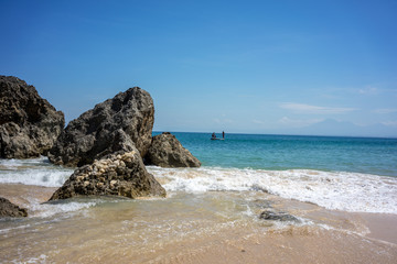Beautiful sea and beach with big rocks