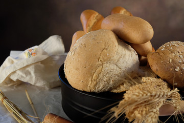 homemade bread on the kitchen table with dark background