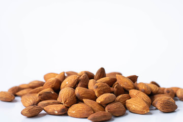 delicious almond on white background