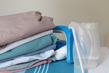 laundry and ironing items .clean and ironed clothing and bedding