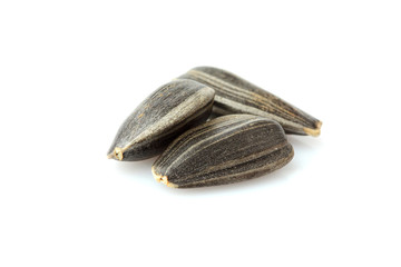 Three sunflower seeds close - up.