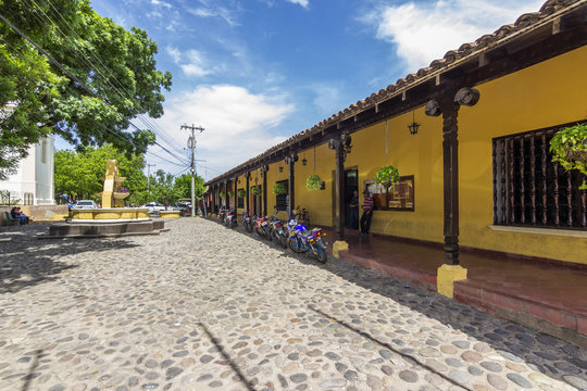 A view of the rural life in Honduras. Colonial towns in the south west at Choluteca with empty streets during midday and a traditional style that bring you back to other era