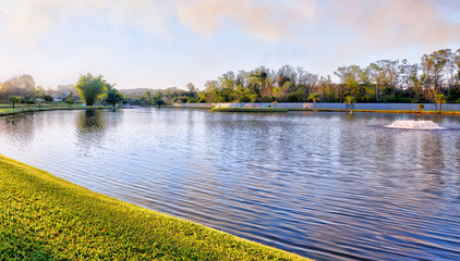 Fototapeta na wymiar Sun lake with lawn
