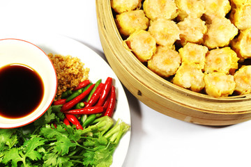 Chinese shumai (dim sum) with soy sauce and side dish