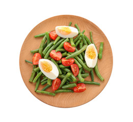 Plate with tasty green beans, eggs and  tomatoes on white background