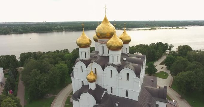 Aerial shooting of the Assumption Cathedral in Yaroslavl city, Russia. View from the top of the temple and the park Strelka