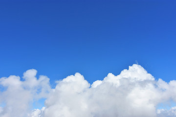 Blue sky with white clouds. Background