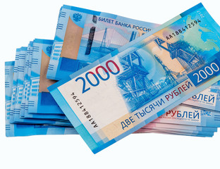 Stack of russian banknotes 2000 rubles. Isolated on white background.