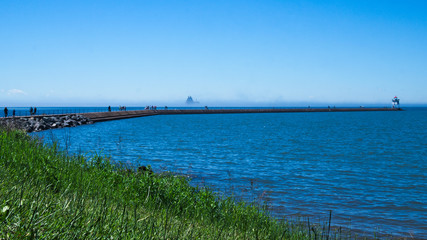 People on jetty at Two Harbors, Minnesota on a sunny day